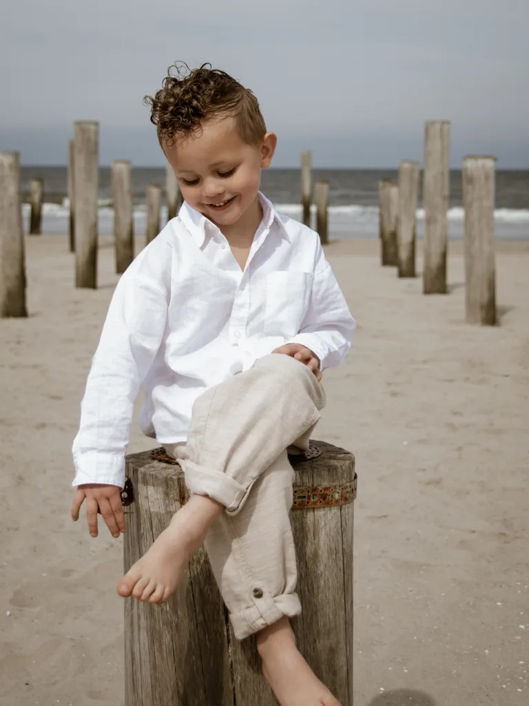 jongen fotoshoot portret strand familiefoto